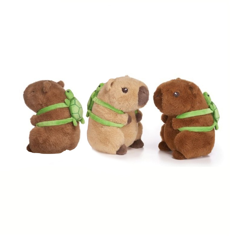 Peluche Capibara c/mochila tortuga 21cm - modelos aleatorios